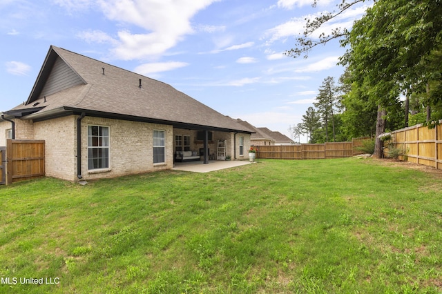 118 Seymour Dr, Madison, MS 39110 - rear view of house featuring a patio area, brick siding, and a shingled roof