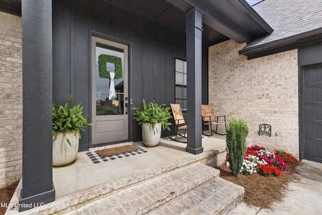 118 Seymour Dr, Madison, MS 39110 - doorway to property with covered porch and brick siding