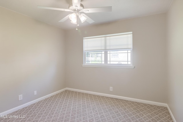 2802 Ridgewood Ave, Pascagoula, MS 39567 - empty room with light colored carpet, baseboards, and ceiling fan