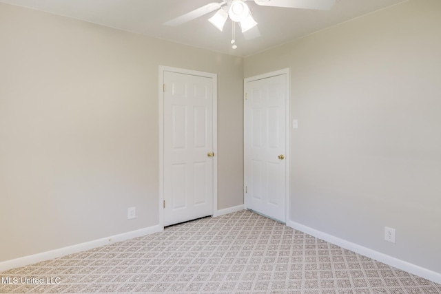 2802 Ridgewood Ave, Pascagoula, MS 39567 - empty room with light carpet, ceiling fan, and baseboards