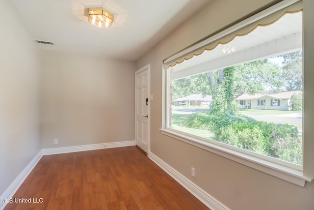 2802 Ridgewood Ave, Pascagoula, MS 39567 - unfurnished room featuring wood finished floors and baseboards