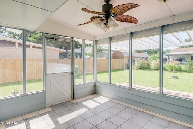 2802 Ridgewood Ave, Pascagoula, MS 39567 - unfurnished sunroom featuring a ceiling fan and lofted ceiling