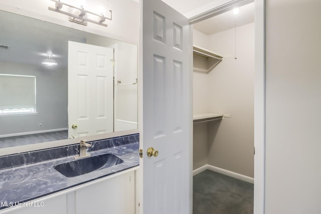 2802 Ridgewood Ave, Pascagoula, MS 39567 - bathroom with baseboards and vanity