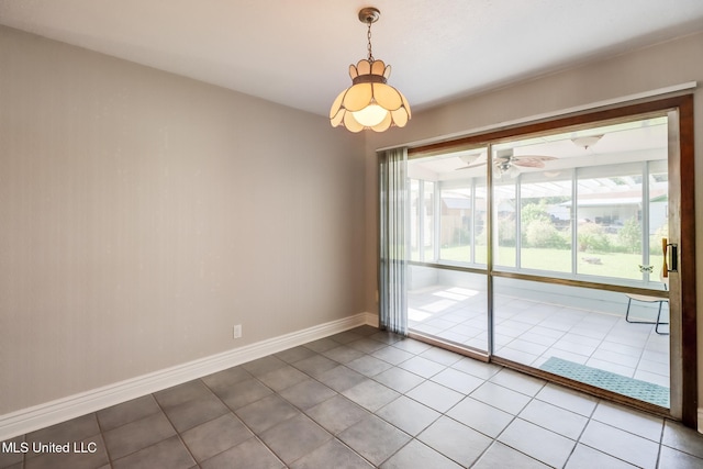 2802 Ridgewood Ave, Pascagoula, MS 39567 - tiled empty room featuring baseboards and ceiling fan