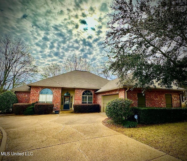 ranch-style home with a garage