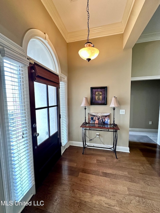 entryway featuring hardwood / wood-style floors and crown molding