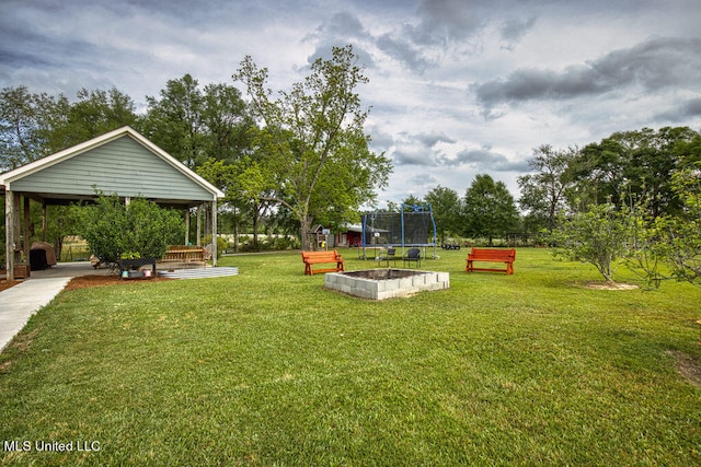 view of yard featuring a trampoline