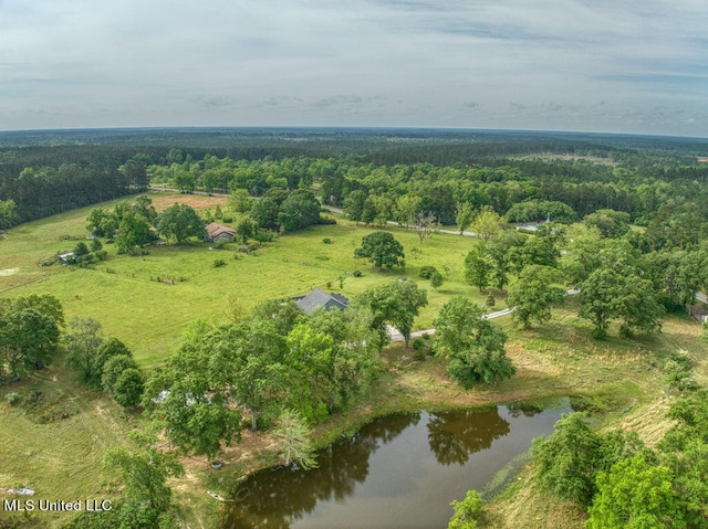 drone / aerial view with a rural view and a water view