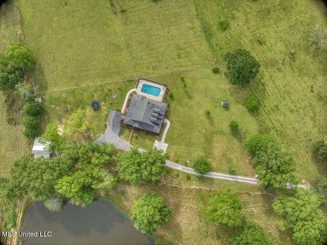 birds eye view of property featuring a water view and a rural view