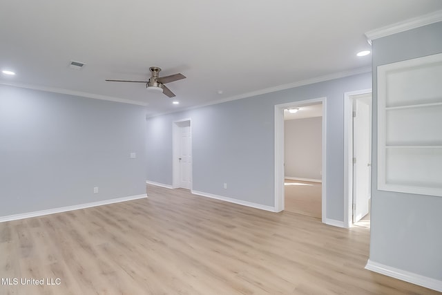 empty room featuring light hardwood / wood-style flooring, ceiling fan, and ornamental molding