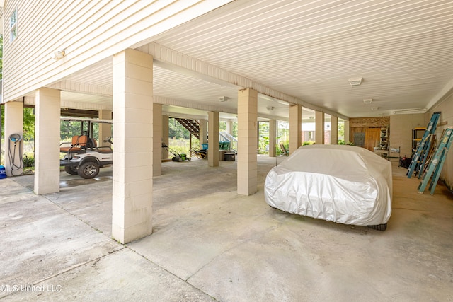 view of patio featuring a carport