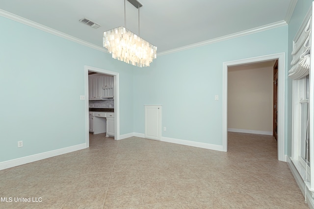 tiled spare room with ornamental molding and a notable chandelier