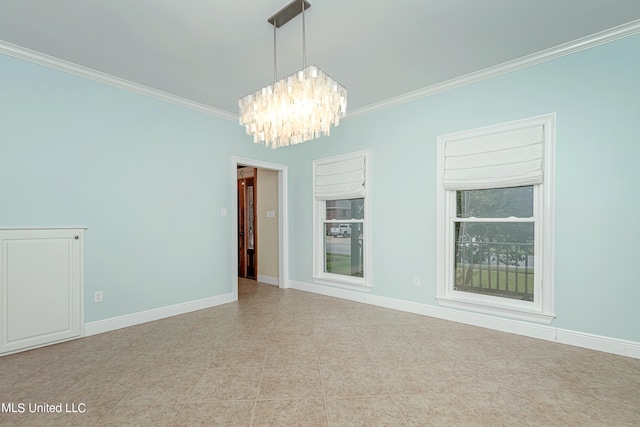 unfurnished room featuring crown molding and a chandelier