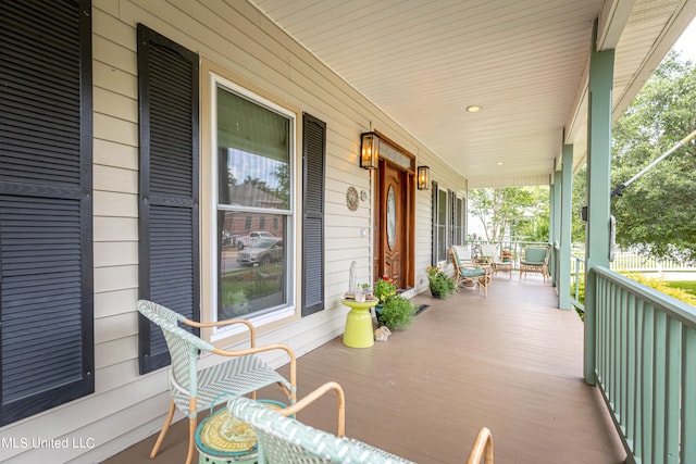 wooden terrace with covered porch