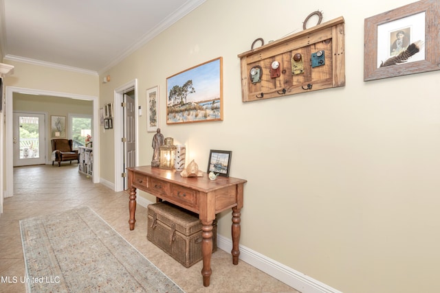 corridor with crown molding and light tile patterned flooring