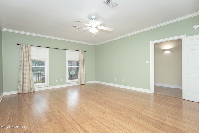 spare room with light hardwood / wood-style floors, ornamental molding, and ceiling fan