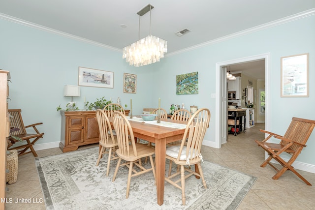 dining area with a notable chandelier, ornamental molding, and light tile patterned flooring