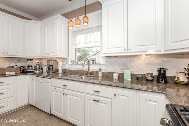 kitchen featuring dishwasher, stainless steel stove, sink, decorative light fixtures, and white cabinets