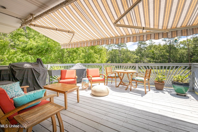 deck with an outdoor hangout area