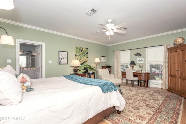 bedroom with ceiling fan, wood-type flooring, and ornamental molding