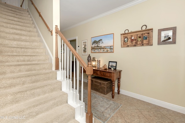 stairs with crown molding and tile patterned flooring