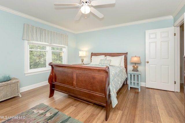 bedroom with ornamental molding, light hardwood / wood-style flooring, and ceiling fan