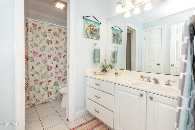 bathroom with vanity, ornamental molding, toilet, and tile patterned flooring