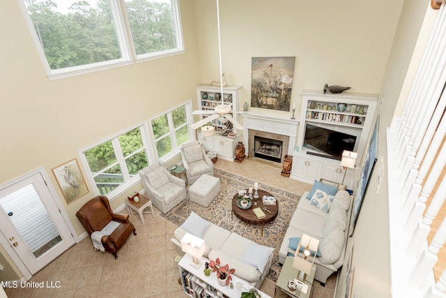 living room featuring a high ceiling