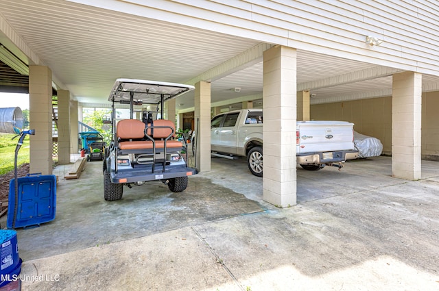 garage featuring a carport