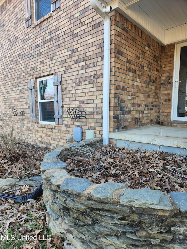 view of home's exterior with a patio area