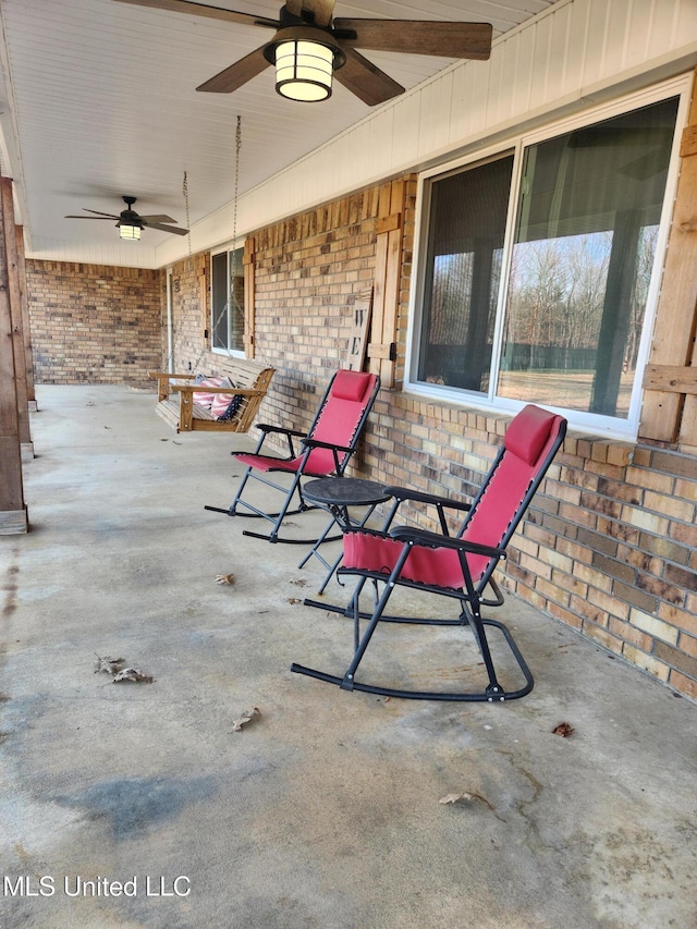 view of patio / terrace with ceiling fan and covered porch