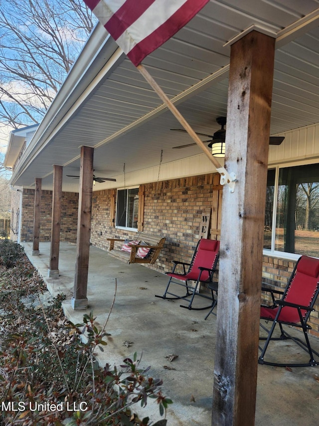 view of patio / terrace featuring ceiling fan