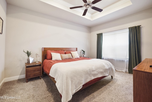 7380 Shearwater Way, Ocean Springs, MS 39564 - bedroom with light carpet, a tray ceiling, ornamental molding, a ceiling fan, and baseboards