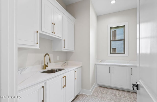 133 Genoa Dr, Madison, MS 39110 - laundry room featuring light tile patterned flooring and recessed lighting