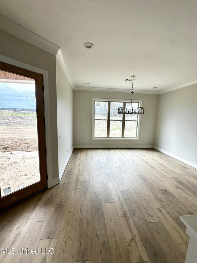 133 Genoa Dr, Madison, MS 39110 - empty room with ornamental molding, a chandelier, and wood-type flooring
