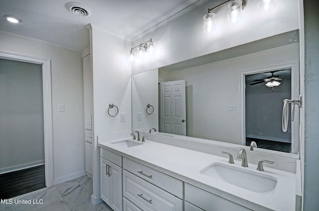 bathroom with vanity, ornamental molding, and ceiling fan