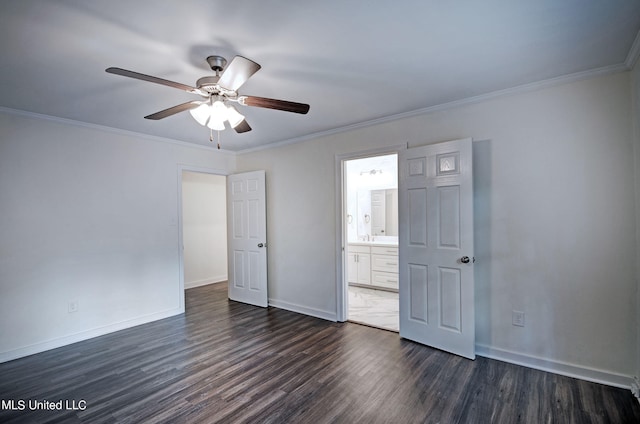 unfurnished bedroom with ornamental molding, dark wood-type flooring, ensuite bathroom, and ceiling fan