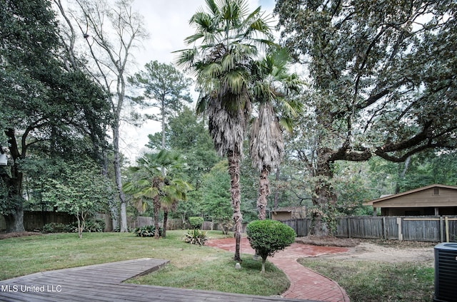 view of yard featuring central AC unit