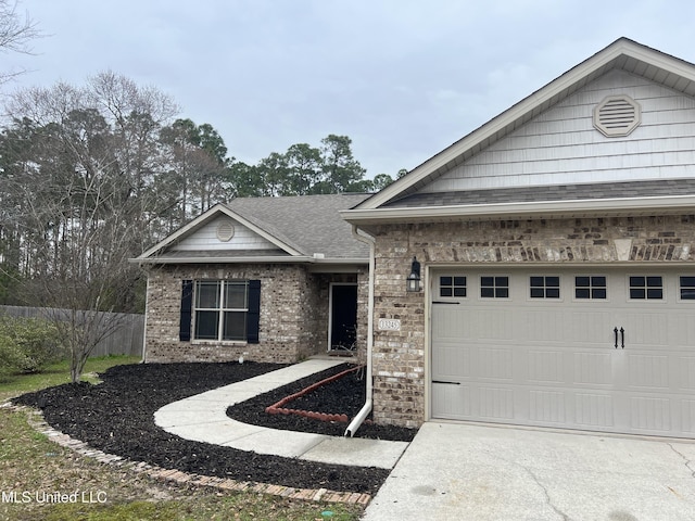 ranch-style house featuring an attached garage, brick siding, driveway, and a shingled roof