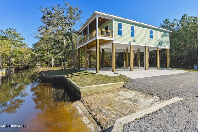 exterior space with a water view