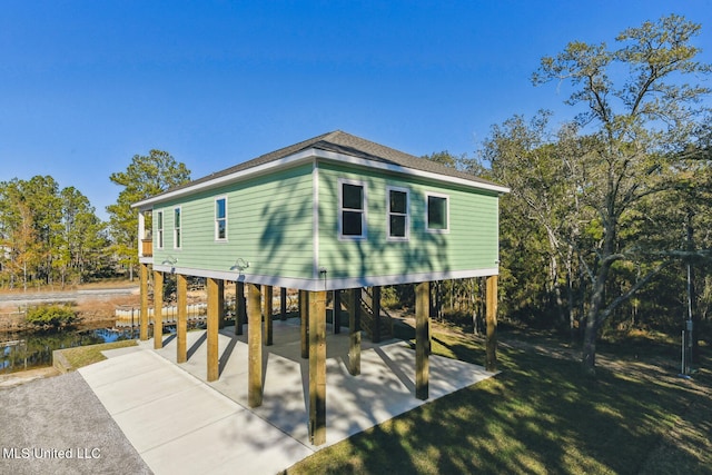 exterior space featuring a carport