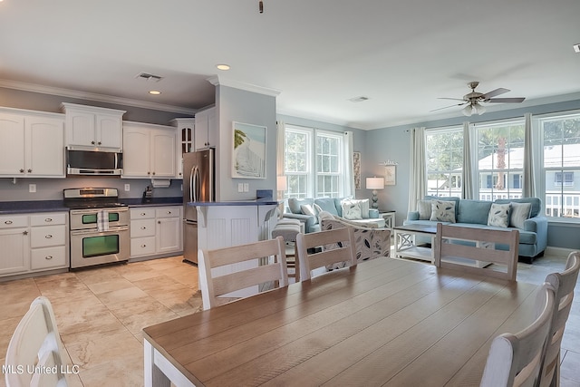 112 Vista Dr, Pass Christian, MS 39571 - dining room with ornamental molding, recessed lighting, ceiling fan, and visible vents