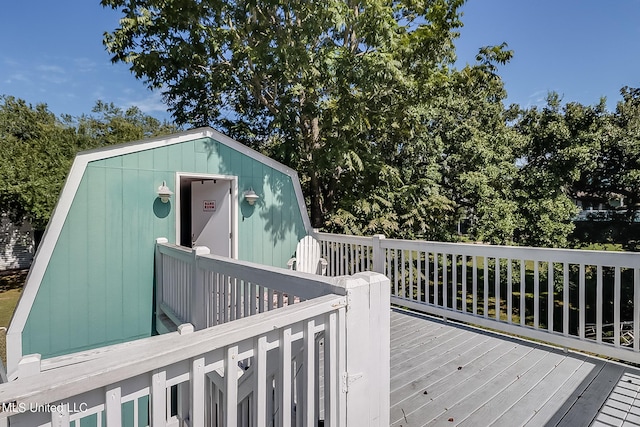 112 Vista Dr, Pass Christian, MS 39571 - deck featuring a storage shed and an outbuilding