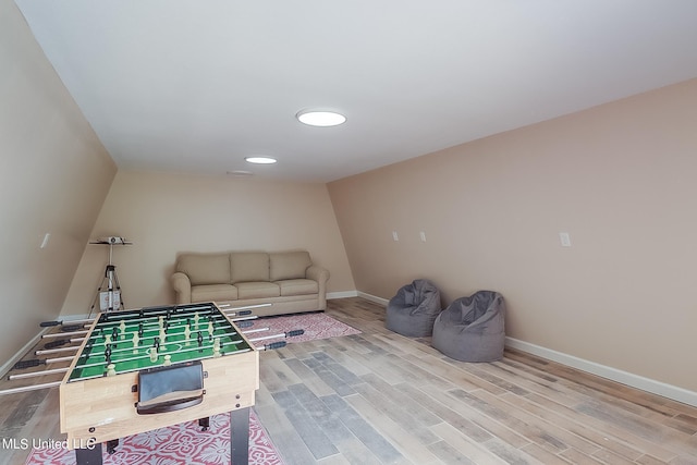 recreation room featuring hardwood / wood-style flooring