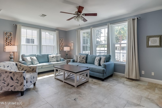 112 Vista Dr, Pass Christian, MS 39571 - living room with crown molding, ceiling fan, visible vents, and baseboards
