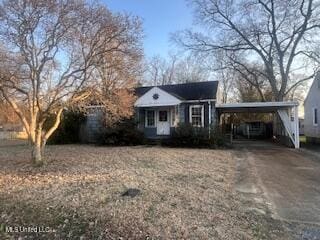 view of front of home featuring a carport