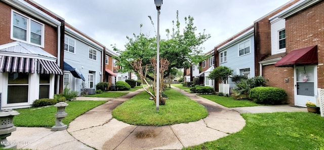 928 Courthouse Rd Unit 25, Gulfport, MS 39507 - surrounding community featuring a residential view and a lawn