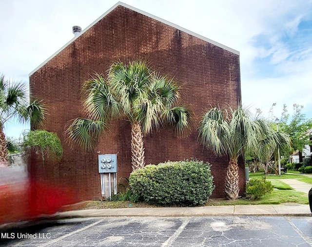928 Courthouse Rd Unit 25, Gulfport, MS 39507 - view of property featuring uncovered parking