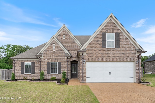 traditional home with brick siding, driveway, a shingled roof, and a garage