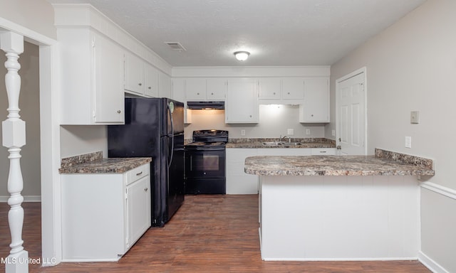 27 Wisteria Ct, Jackson, MS 39204 - kitchen featuring black appliances, under cabinet range hood, a sink, a peninsula, and dark wood-style floors